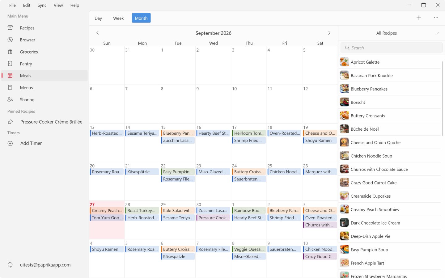 The Meals screen on Windows: the month view in the middle with today highlighted, the Day, Week and Month switch above it, the add and actions buttons in the upper right, and the recipes sidebar on the right.